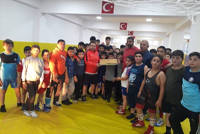 GÜREŞÇİLERE TATLI DOPİNGİ