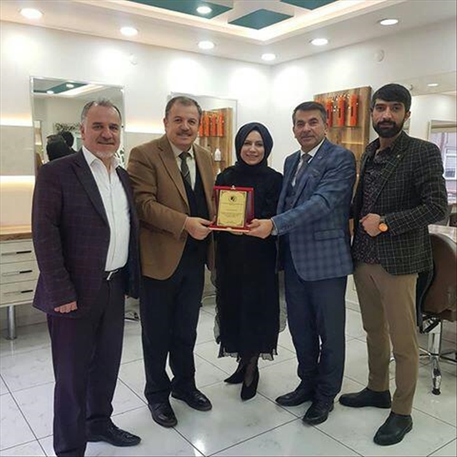 GENEL BAŞKANDAN BAŞARI PLAKETİ