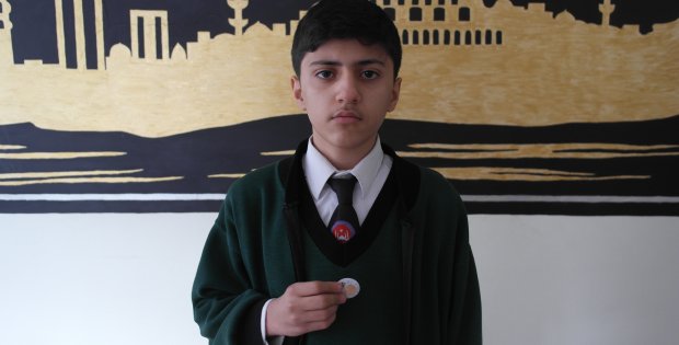 YARIŞMADA KAZANDIĞI ALTINI HALEP`E BAĞIŞLADI