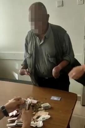 Dilencinin üzerinden bin lira çıktı