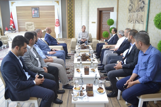 MHP´Lİ ÖZYÜREK´TEN REKTÖRE ZİYARET