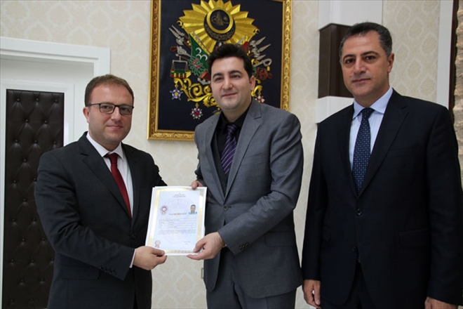 POLİSLERE BAŞARI BELGESİ