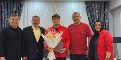 Şampiyon sporculara anlamlı ziyaret